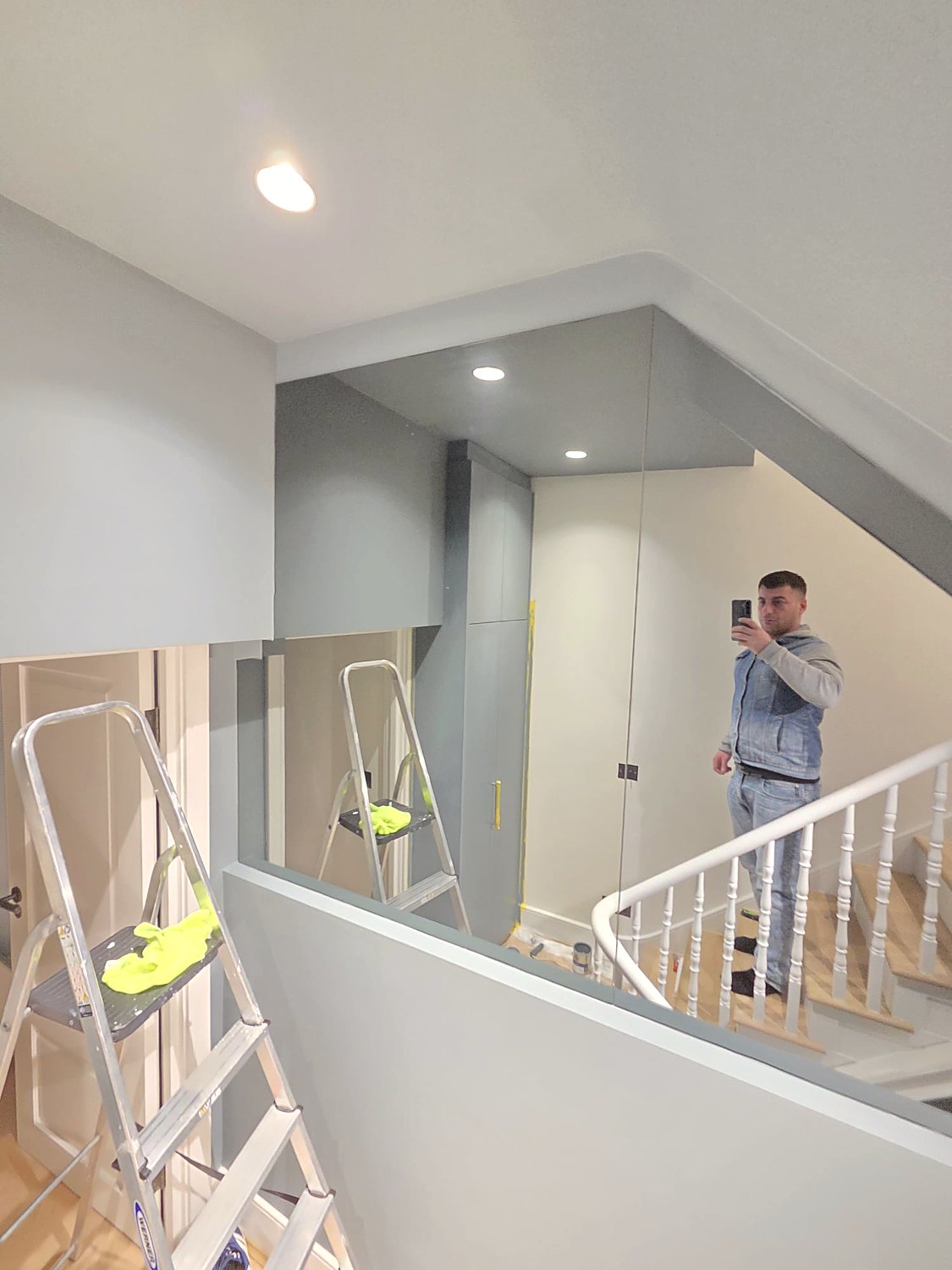 Grey landing above a white staircase