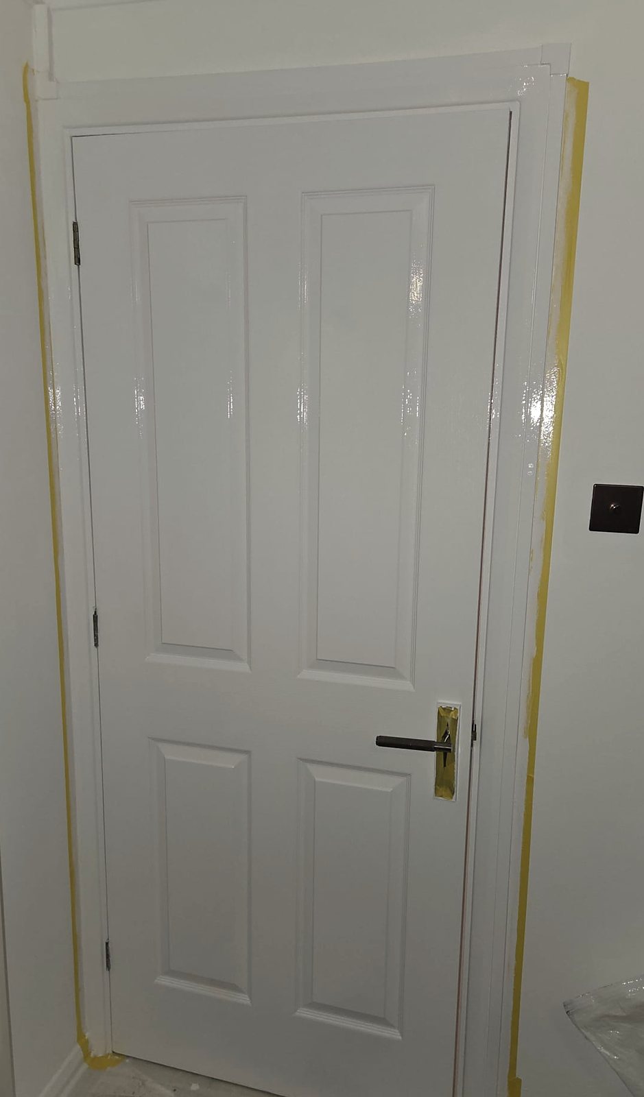 Panelled door in white gloss, painted by Zakro